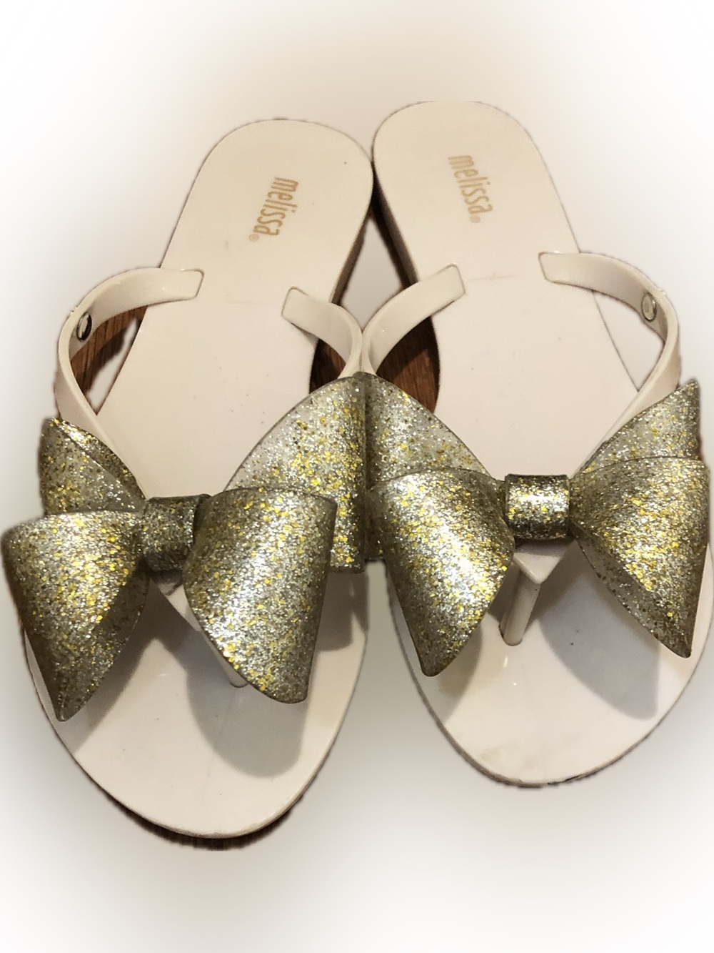 Melissa Women’s White Jelly Flip Flops with Gold Bows